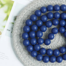 Load image into Gallery viewer, Dark Blue Wooden Bead Garland With Tassels
